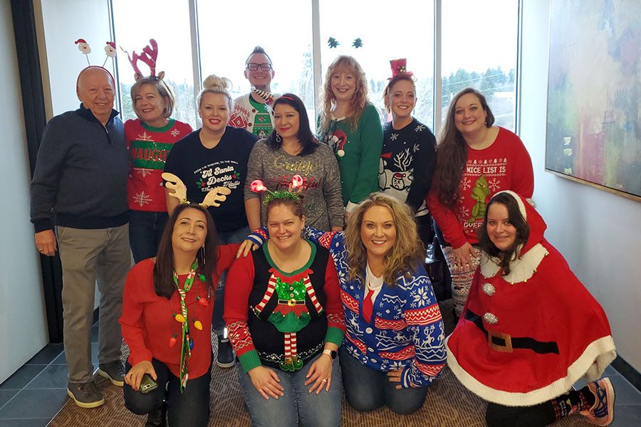 About Our Agency - Portrait of Mosaic Insurance Staff During Christmas Holiday Party in the Office
