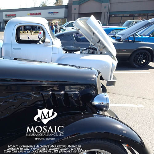 Blog - Classic Auto Insurance, Black Classic Car and White Classic Car with Hood Open and More Classic Cars in Background in Lynnwood Washington with Mosaic Insurance Alliance