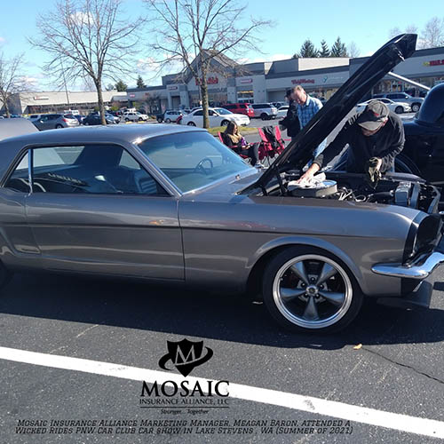 Blog - Classic Auto Insurance, Silver Classic Car with Hood and Truck Open with a Man Working on the Engine in Lynnwood Washington with Mosaic Insurance Alliance